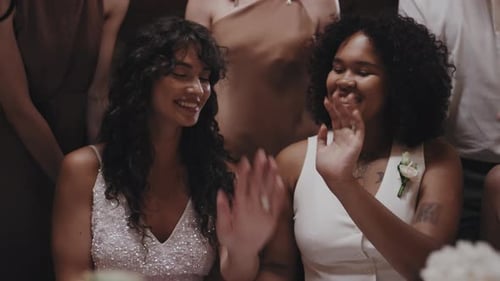 Joyful Wedding Celebration with Clapping Guests