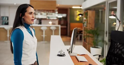 Hotel, reception and woman with bell to ring, request assistance or urgent attention for service