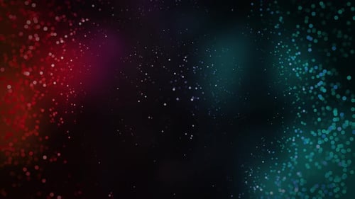 Glamour Collection: Tiny reddish blue bokeh emanating from center and spreading across over a dark g