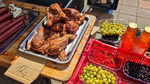Outdoor Market with Sausage, Chicken and Berries