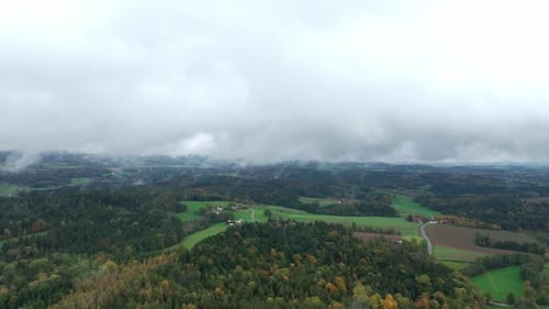 Aerial View Of Countryside Landscape With Autumn Forests And Fog In The Morning - Drone Shot