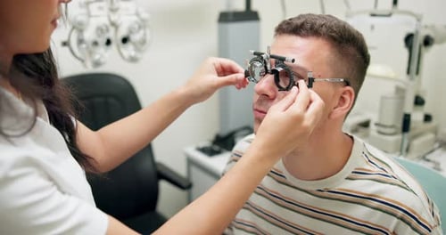 Optometry, test glasses and man with service, healthcare and lens with professional