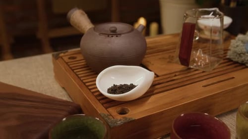Serving of Oolong in Holder Cup on Gongfu Tray at Tea House