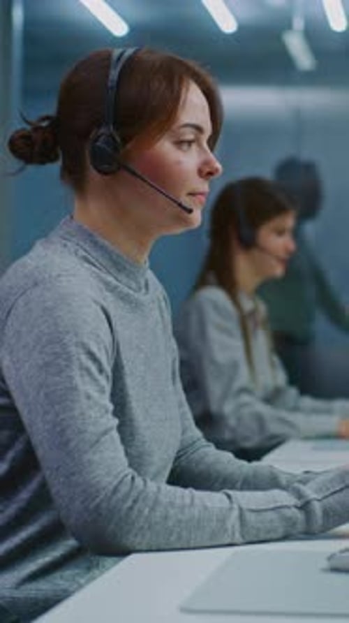 Woman Working in Modern Call Center Office Environment