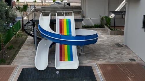 Apartment Complex Courtyard with Swimming Pool and Water Slide
