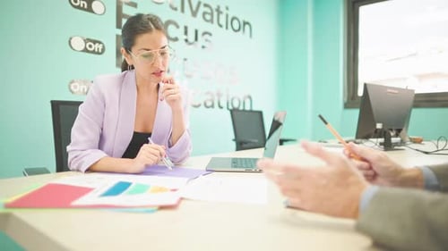 Business Meeting in Modern Office with Colorful Wall