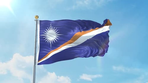 Marshall Islands Flag Waving in Wind with Blue Sky