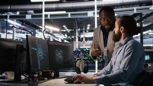 Data Scientists Collaborating on Complex Visualizations in Modern Office