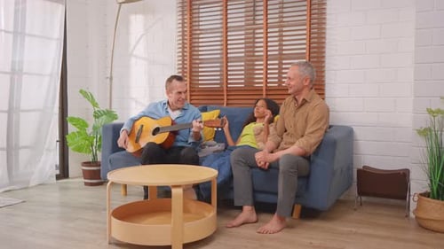 Family Enjoying Music Together at Home