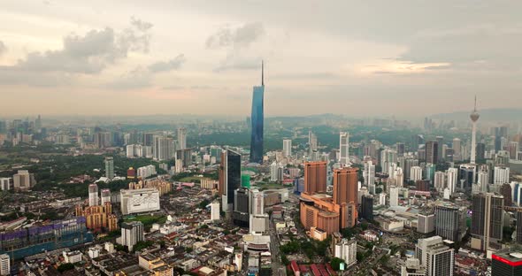 Drone flight toward Merdeka 118 skyscraper and city skyline view of ...