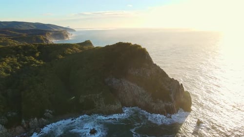 Ocean View Cliff at Sunset Overlooking Water Sky and Horizon