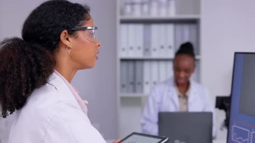 Medical Professionals Working in a Modern Laboratory