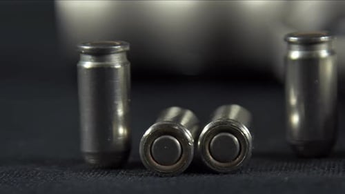 Gun And Bullet On The Table 2