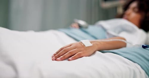 Hand, medical and iv drip with chid in hospital for recovery from operation or surgery closeup