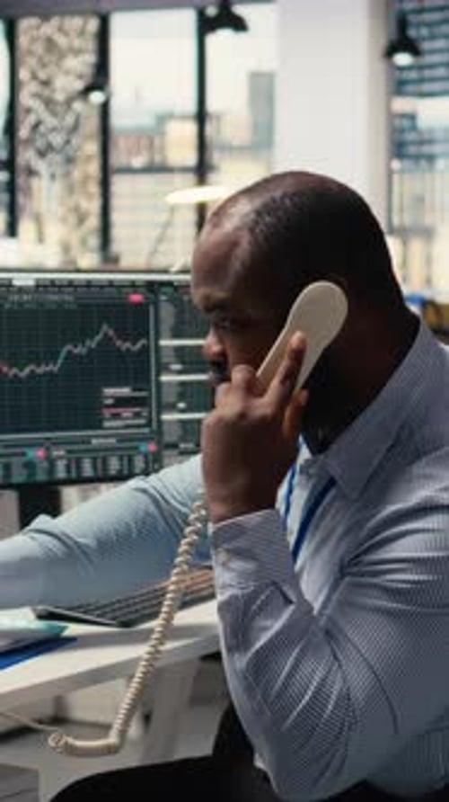 Vertical Video Worried Portfolio Managers Make Telephone Calls in Response to Black Swan Event
