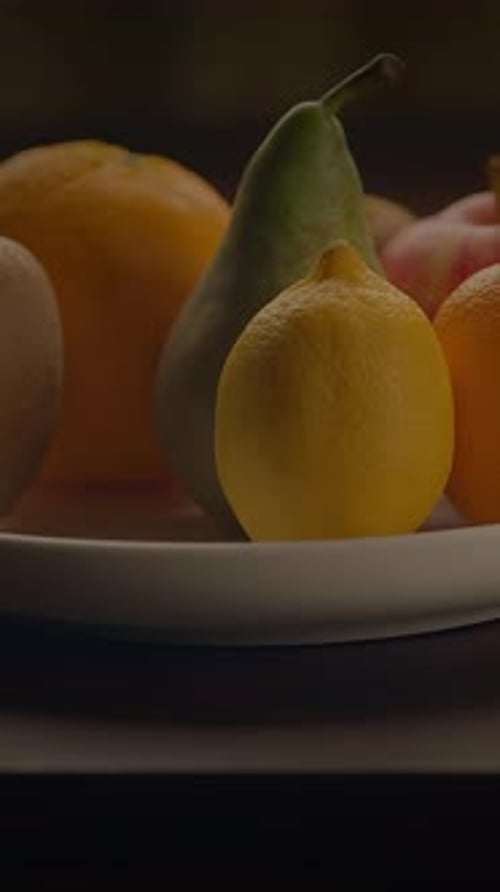 Arrangement of fresh fruit on a white plate