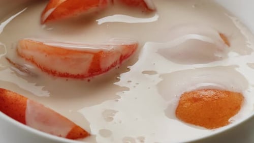 Orange Fruit Chunks in Creamy White Dessert