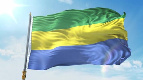 Gabon Flag Waving In Wind With Blue Sky