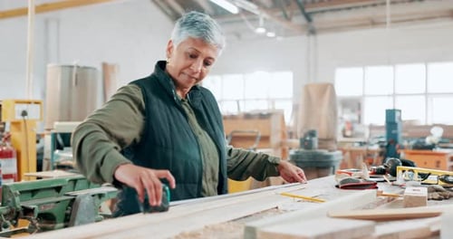Construction, wood and measure with woman in workshop for manufacturing, planning and building
