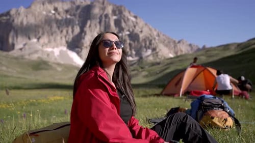 Traveler Camping at the Foot of the Mountain