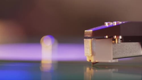 Record Player Needle on Vinyl Record Close Up