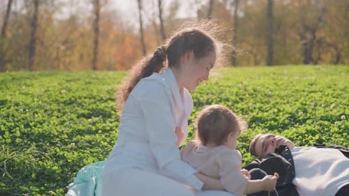 Mother and Child at Park Tender Family Moments During Peaceful Outdoor Gathering Candid Family