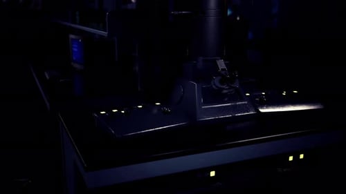 Modern Microscope Animating in Dark Lab for Scientific Research