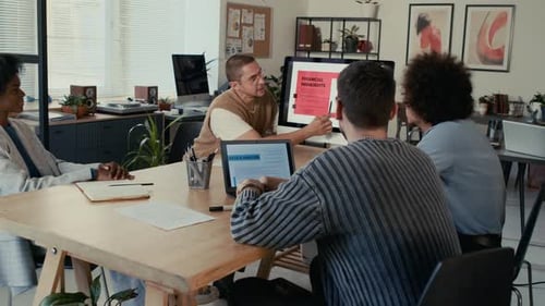 People Clapping to Support their Colleague After End of Presentation in Office