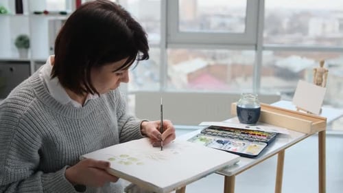 Woman Painting Watercolor Art Indoors