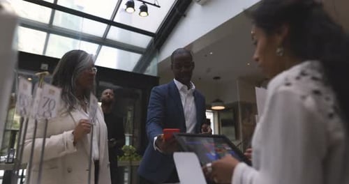 Customers Using Mobile Payment at Bakery Point of Sale 3034 Years