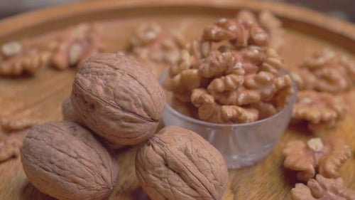 Close Up of Delicious Walnuts on Wooden Tray