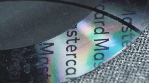 Macro slide shot, halogram on plastic card, inscription Master Card.