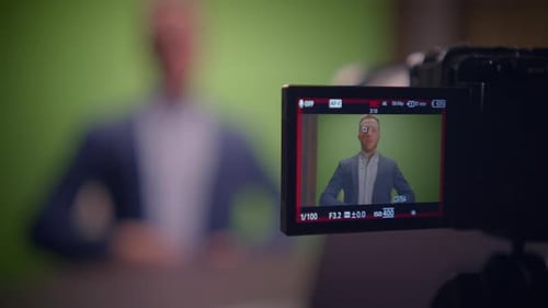 A Professional Video Shoot Featuring a Green Screen Background for Enhanced Visuals Creativity