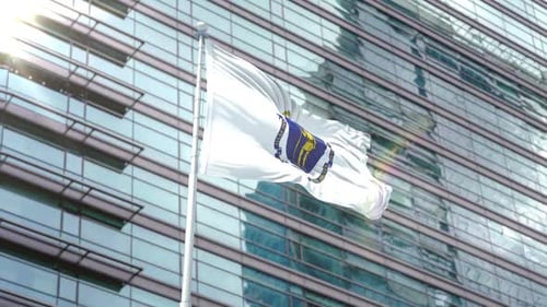 Massachusetts State Flag Waving In Front Of Modern Building