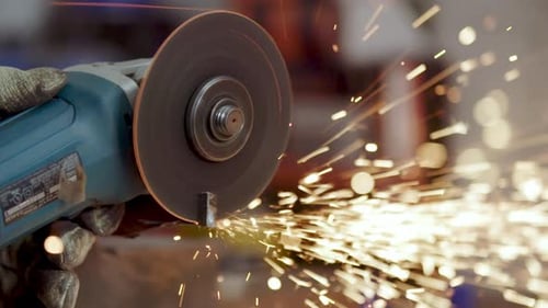 Metal Saw Cutting Metal with Sparks