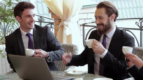 Business Professionals Savor a Delightful Lunch on a Sunny Terrace