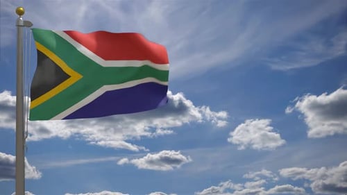 Waving South Africa Flag Against a Clear Blue Sky