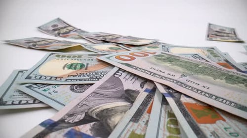 United States Dollar (USD) banknotes close up on white background isolated 4K