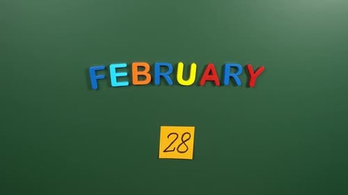 Hand sticking a sticker 28 February calendar day on school board. 28 date of February. Twenty eight