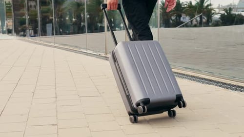 Tourist Man with Suitcase Baggage in Spain A Traveler with Luggage Suit Jacket on Business Street Go