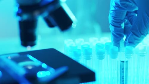 Test Tube Labeled COVID-19 in Lab