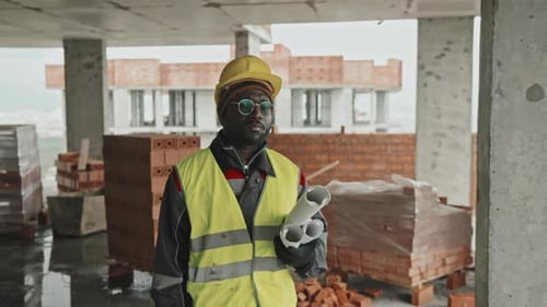 Black Engineer At Construction Site