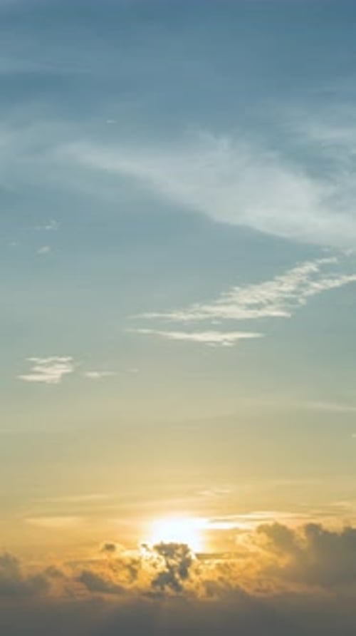 Clouds Moving in Sky during Colorful Sunrise