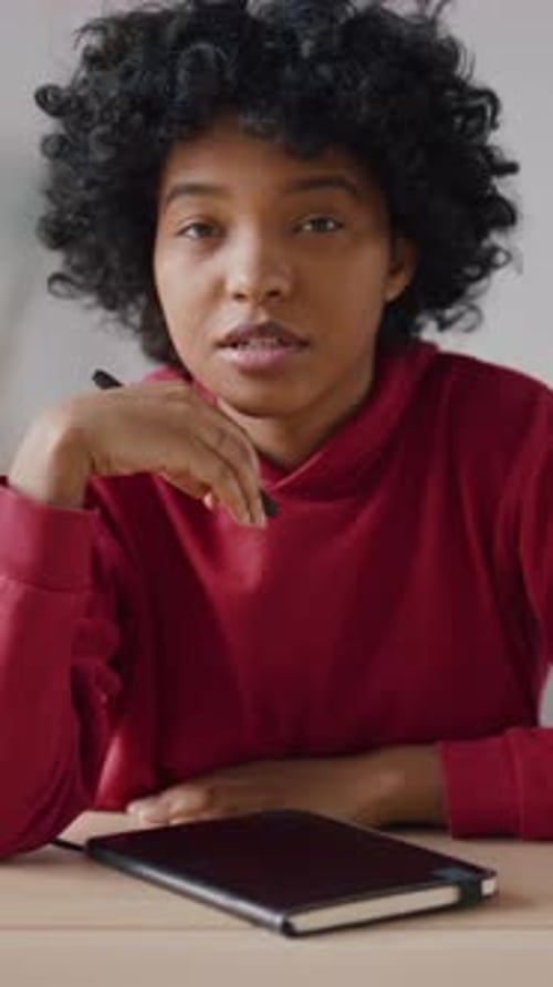 Black Teen Girl Student Answering at Question in Online Lessons in School Vertical Video Portrait