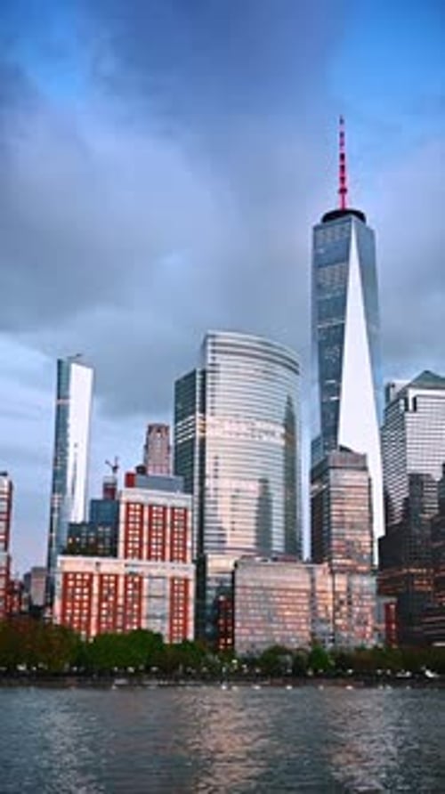 Modern glass high-rises of New York reflecting the bright light. Low angle view on the skyline