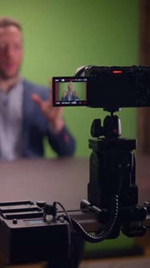 An Advanced Professional Video Recording Setup Featuring a Green Screen Background for Creatives