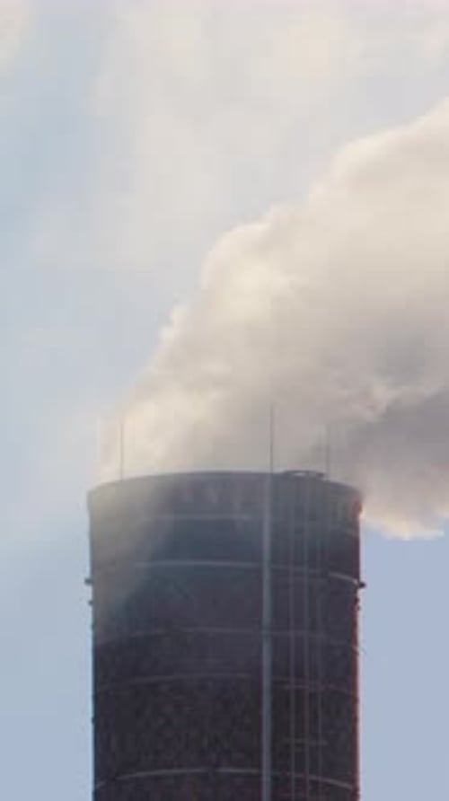 Choking plumes of factory smoke carbon emissions released into atmosphere