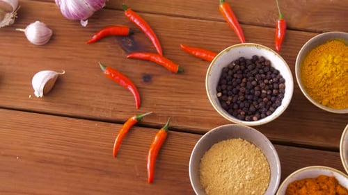 Spices and Herbs Still Life on Wooden Table