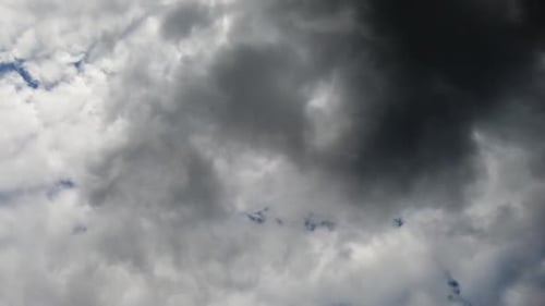 Beautiful dark ominous storm clouds rolling by, no persons
