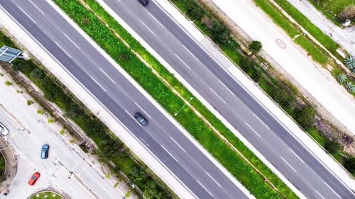 Aerial view of vehicles driving on the roads with drone